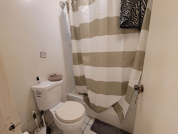 5th image of 3069 N Oakland Ave #203