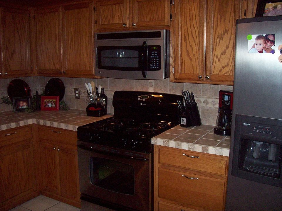 new stainless steel app.s (new tile countertop and backsplash)