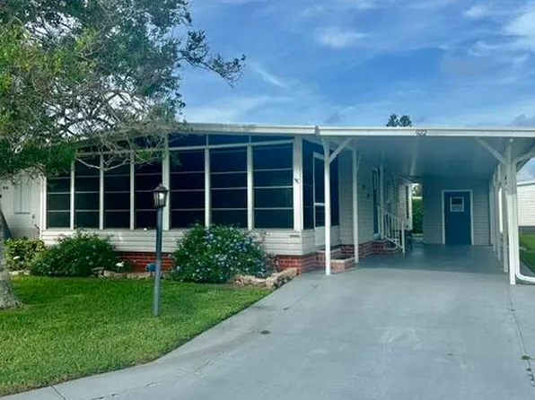 922 Thrush Cir, Barefoot Bay, FL 32976