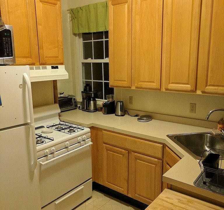Kitchen with Hardwood cab., microwave, gas stove
