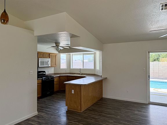 3rd image of 6095 E 42nd St