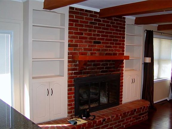 Family room as viewed from Kitchen. Notice the WBFP complete with gas logs.
