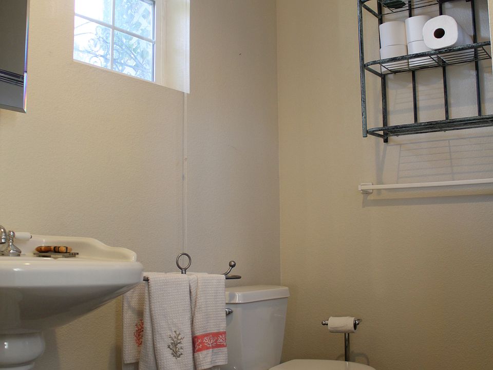 Downstairs bathroom with standing shower.