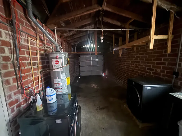 Garage, hot water heater, washer and dryer