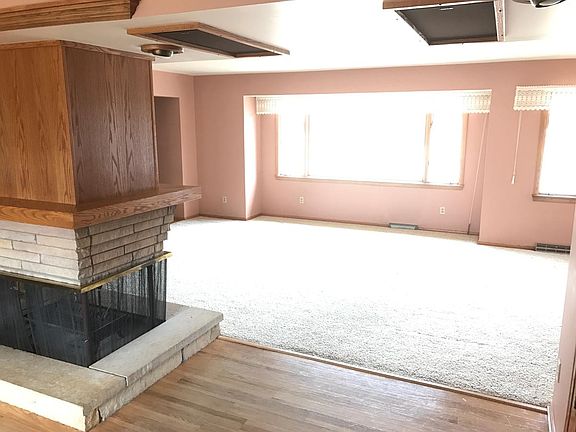 Fireplace and large living room.