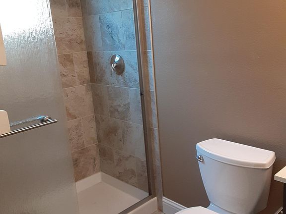 Porcelain tile shower and floor
