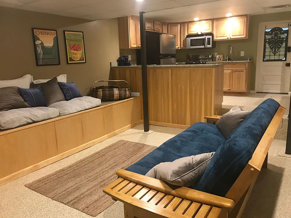 Living room with Futon sofa which can be used as extra bed for guest