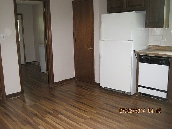 Kitchen leading to laundry