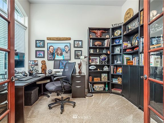 Office with high ceiling, French doors