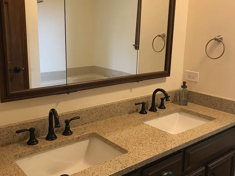 double vanity master bath with new quartz counter tops and K