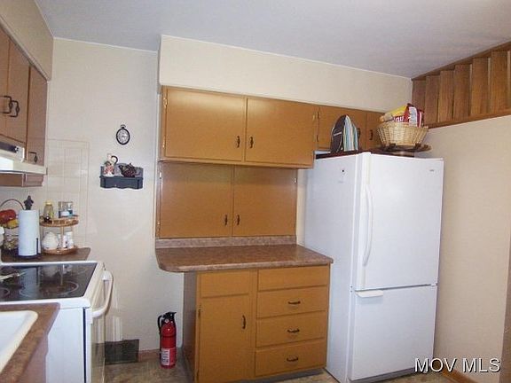 Kitchen has built in pantry