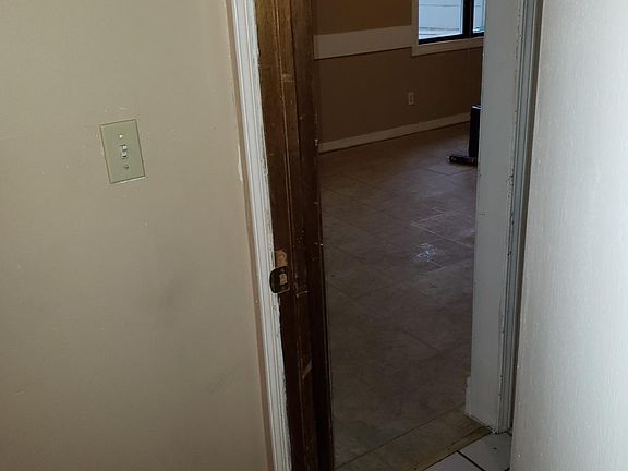 Bedroom to hall to the large livingroom