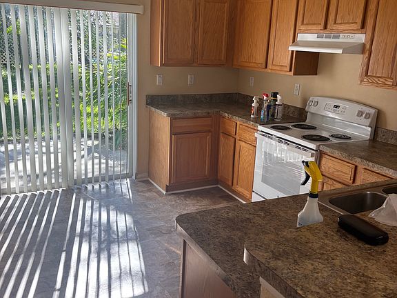 Kitchen with stove, dishwasher and refrig.