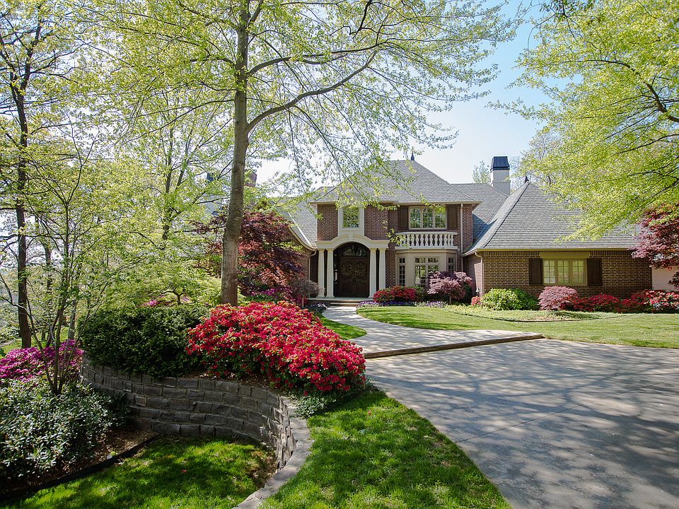 Luxury abounds throughout this well-appointed home five gracious Living Areas, custom Wine Grotto, Safe Room, sumptuous Master Suite with dream Bath, perfect Guest Suites & so much more!