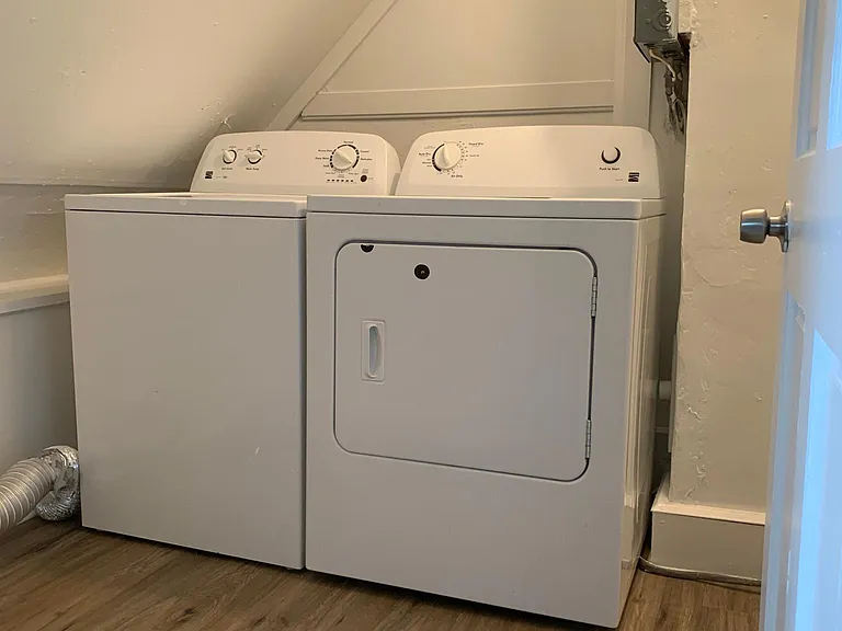 Laundry hookups only. Tenant must supply their own laundry machines. Machines pictured are not included.