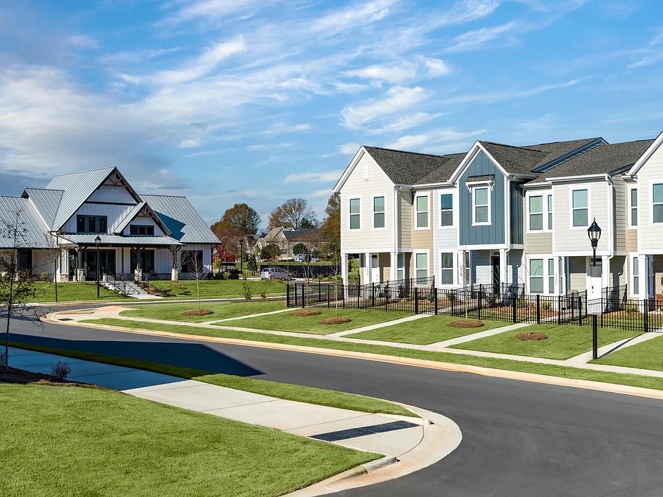 The community boasts an abundance of vibrant, well-maintained greenery.