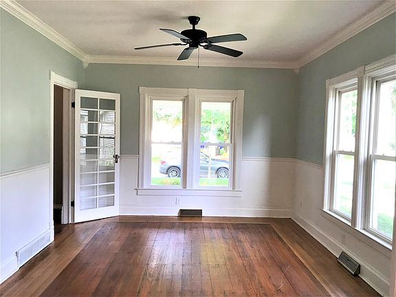 Living Room filled with windows and natural light.