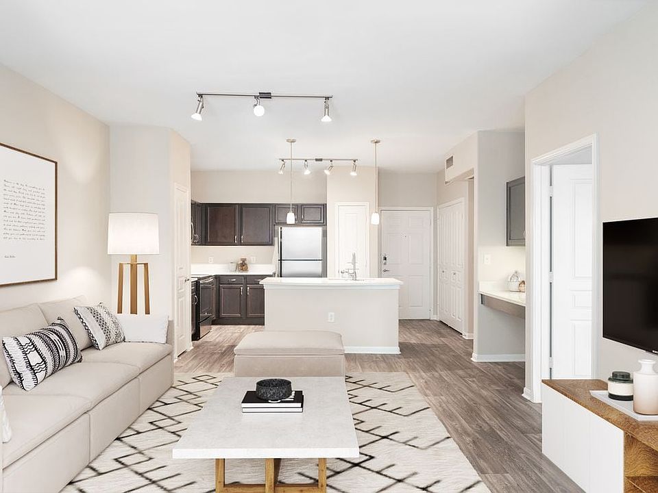 Kitchen and living room with hard surface vinyl plank flooring