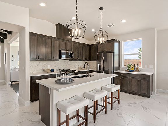 Pictures are of similar completed homes. Actual home is under construction and finishes may vary.