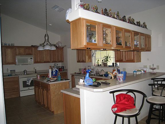 open kitchen adjacent to dining area