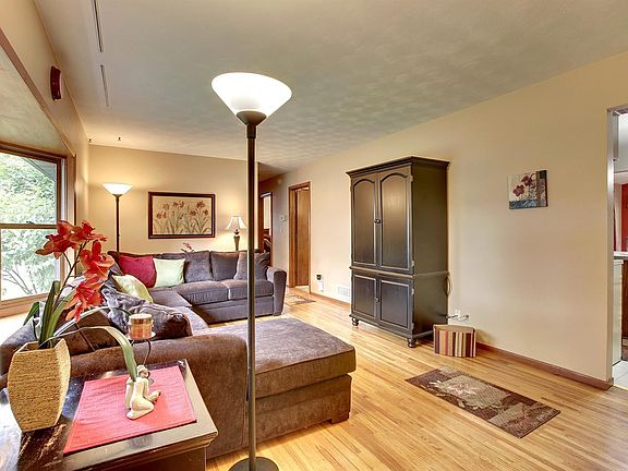 Family room. Large windows make it so light and bright!