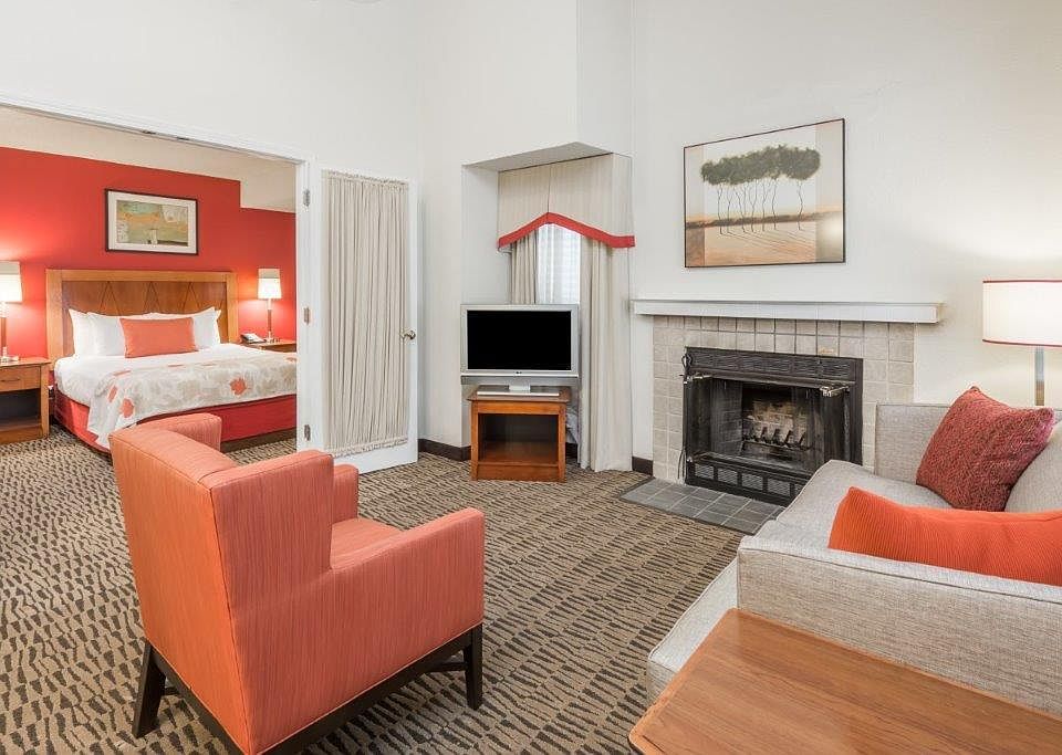 Our Penthouses have 2 Bedrooms and 2 Floors. This is the picture will show you what is on the right side of the first floor. There you will have: A living area with a Sofa Bed and a TV and a Bedroom. In the following pictures you will see the rest of the