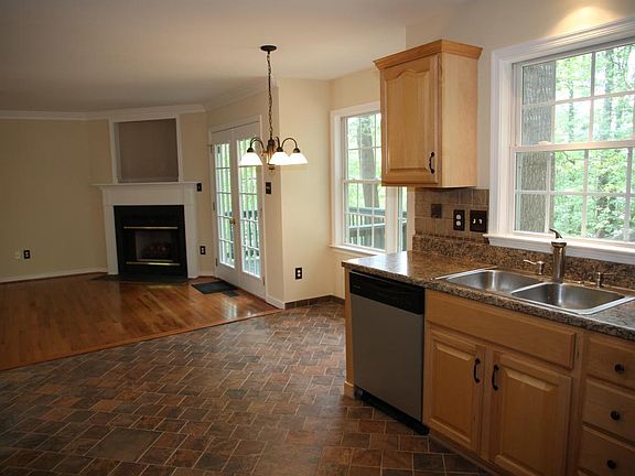 Kitchen with eat-in area open to family room