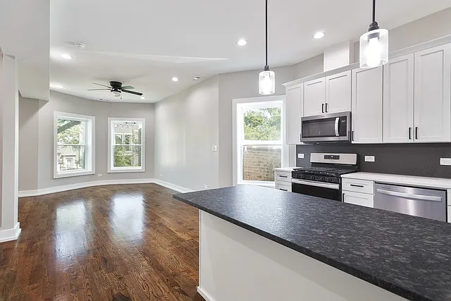 Building Photo - 6520 S Minerva Ave #3