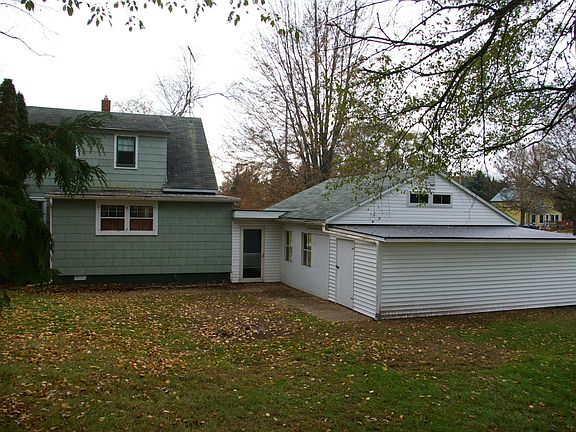 Backyard, garage with shed add-on