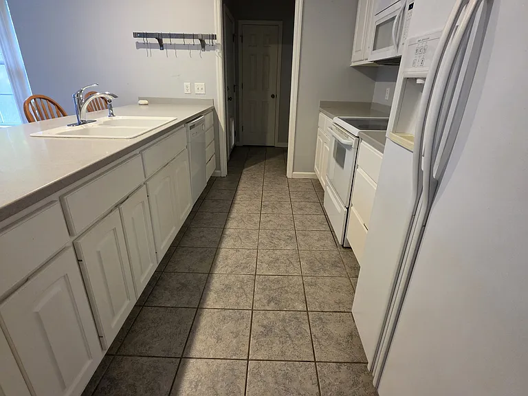 Kitchen with pantry at the end