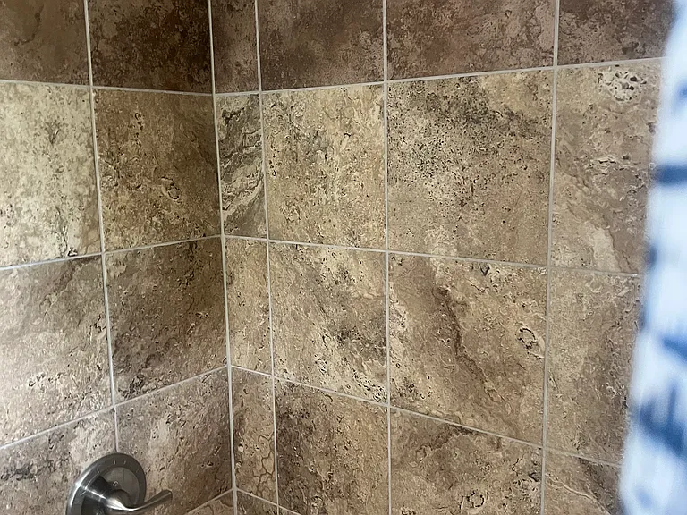 Full bath with ceramic tile