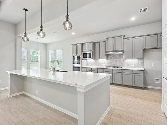 Kitchen with pendant lighting