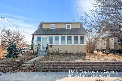 "Charming 4-Bedroom Home with 2 Full Baths in the Heart of Saint Paul!" — Photo 1