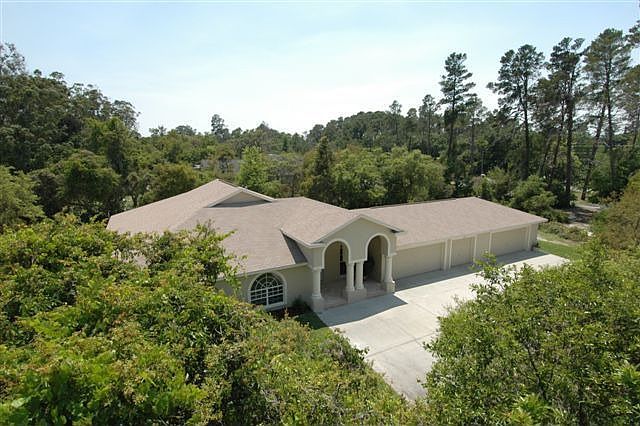 Lush landscaped home ready for you!