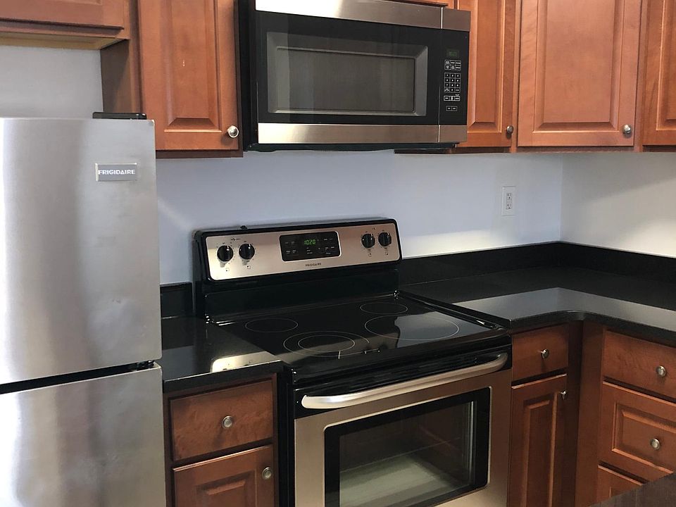 Kitchen with granite counter tops and stainless steel appliances