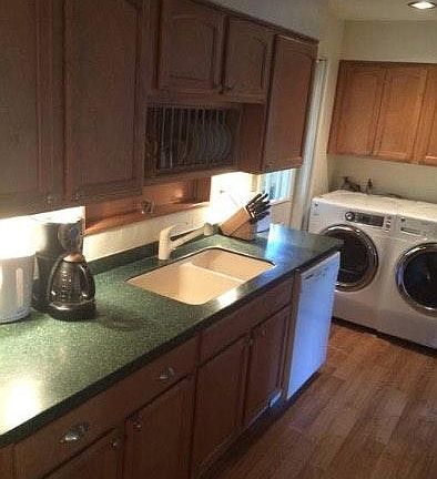 Kitchen with dishwasher, electric range, microwave, refriger