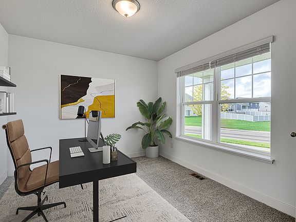 Office right off the main entry with big windows