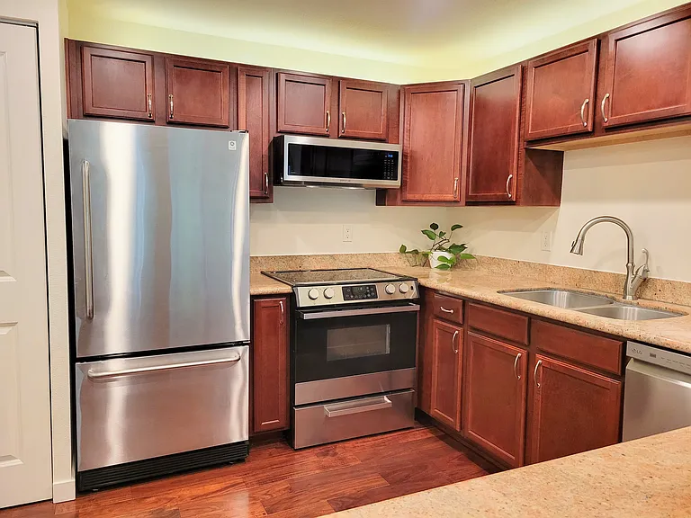 Spacious kitchen with ample usable counterspace and cooking-friendly layout.