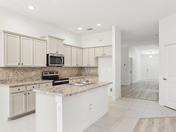 5th image of 819 NE Whistling Duck Way