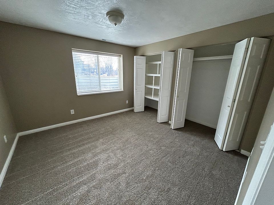 Bedroom #1 with 2 large closets and south-facing window.