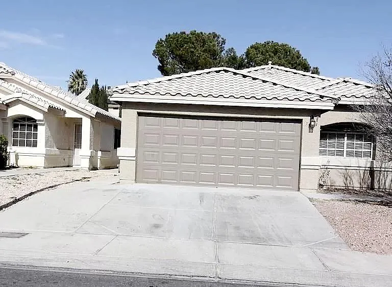 One level house, low maintenance yard, and large 2 car garage