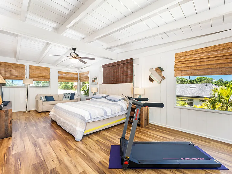 Spacious detached studio featuring vaulted beam ceilings, full kitchen, split AC, and an open-concept layout ideal for guests, extended family, or a private retreat.