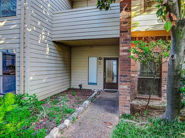 Entrance to the charming townhome.