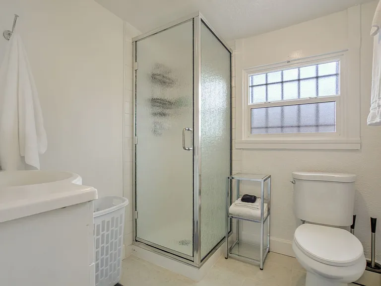 Fresh, updated, and well-lit_features a standing shower (no bathtub).