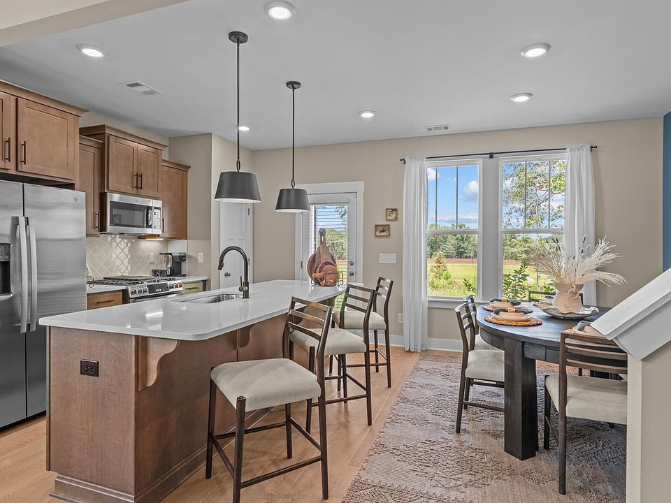 Organic Modern Kitchen with natural brown cabinets and modern decor.