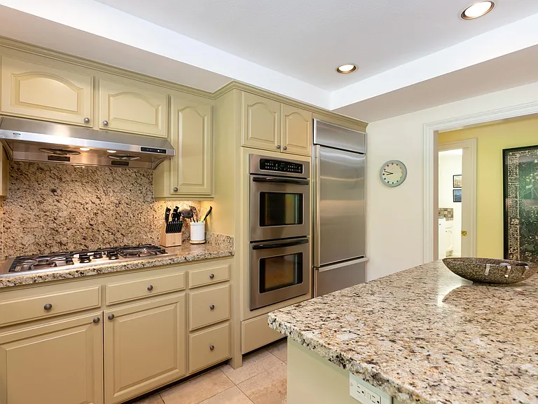 Gas stove, double ovens, new fridge.