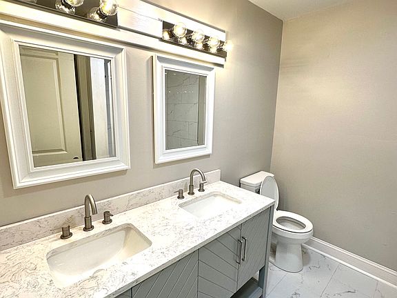 Bathroom - Double Marble Vanity and tile floors