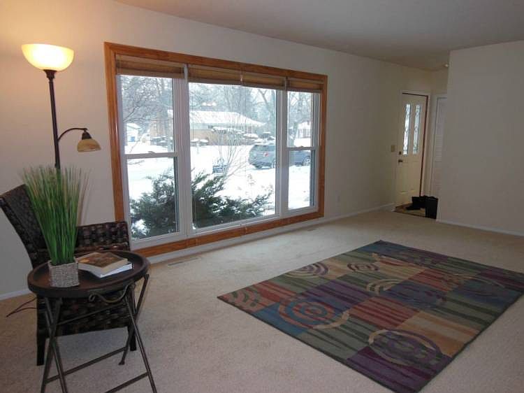 Great picture window in the living room which also has fresh paint and new carpet.