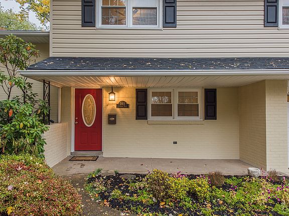 New Cabernet colored front door with leaded glass