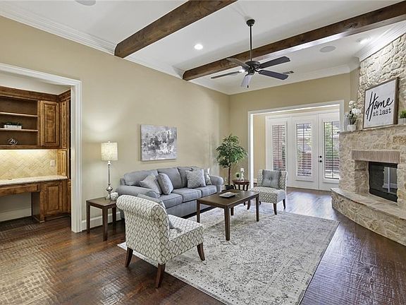 The family room is adjacent to the kitchen and also features a perfectly located built in desk and planning area for the head of the house!